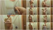 6653e5b90a5eb A pregnant woman takes a shower