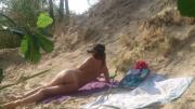 665527dccfc66 Voyeur waits to see perfect pussy on beach