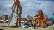 66612601a7dc2 Hot chick goes topless on beach
