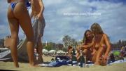 669d9a1f054d0 Two out of three friends enjoy topless on beach